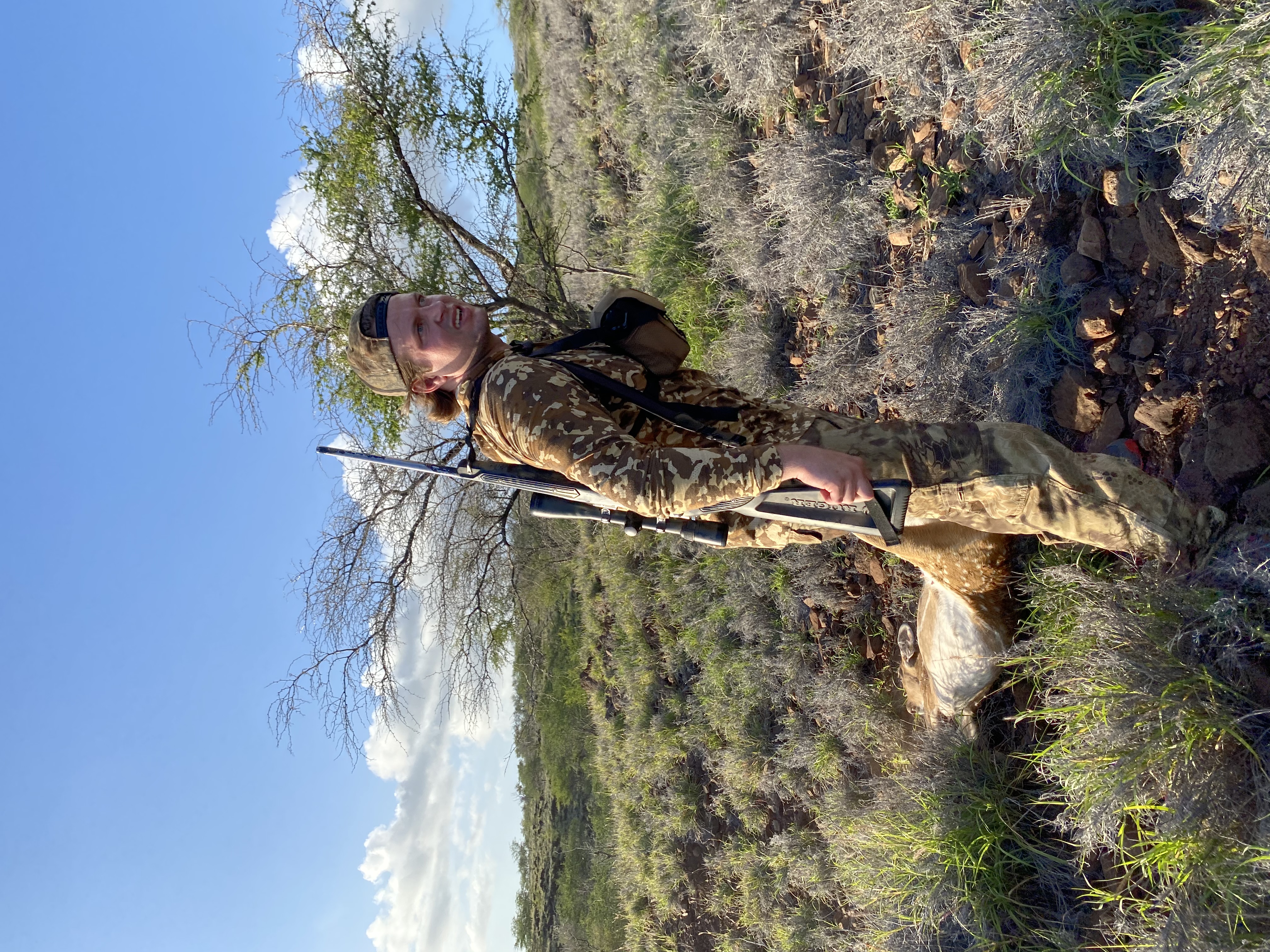 Rifle hunter on a Molokai ridge